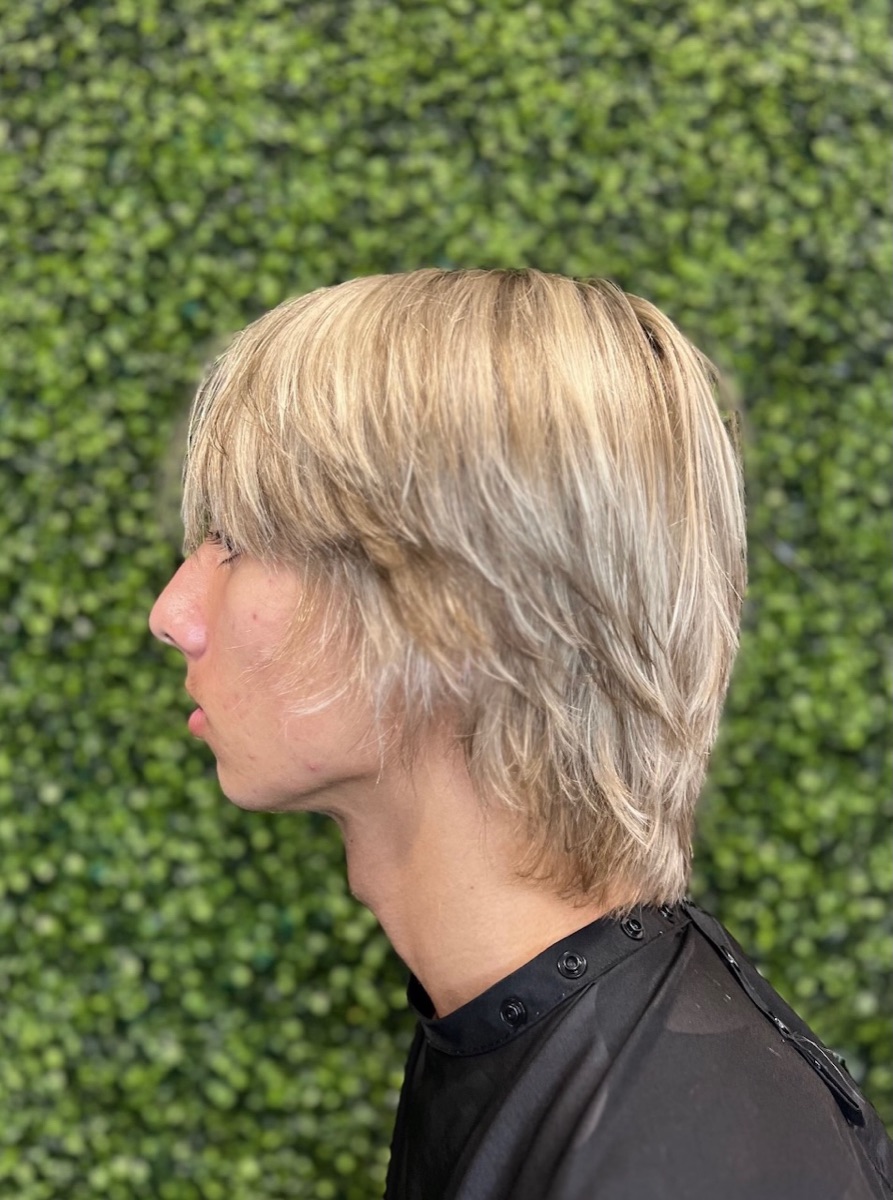 Blonde layered shag haircut at Moxi Hair Studio in McKinney, TX